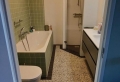 Badkamer met groen en terrazzo